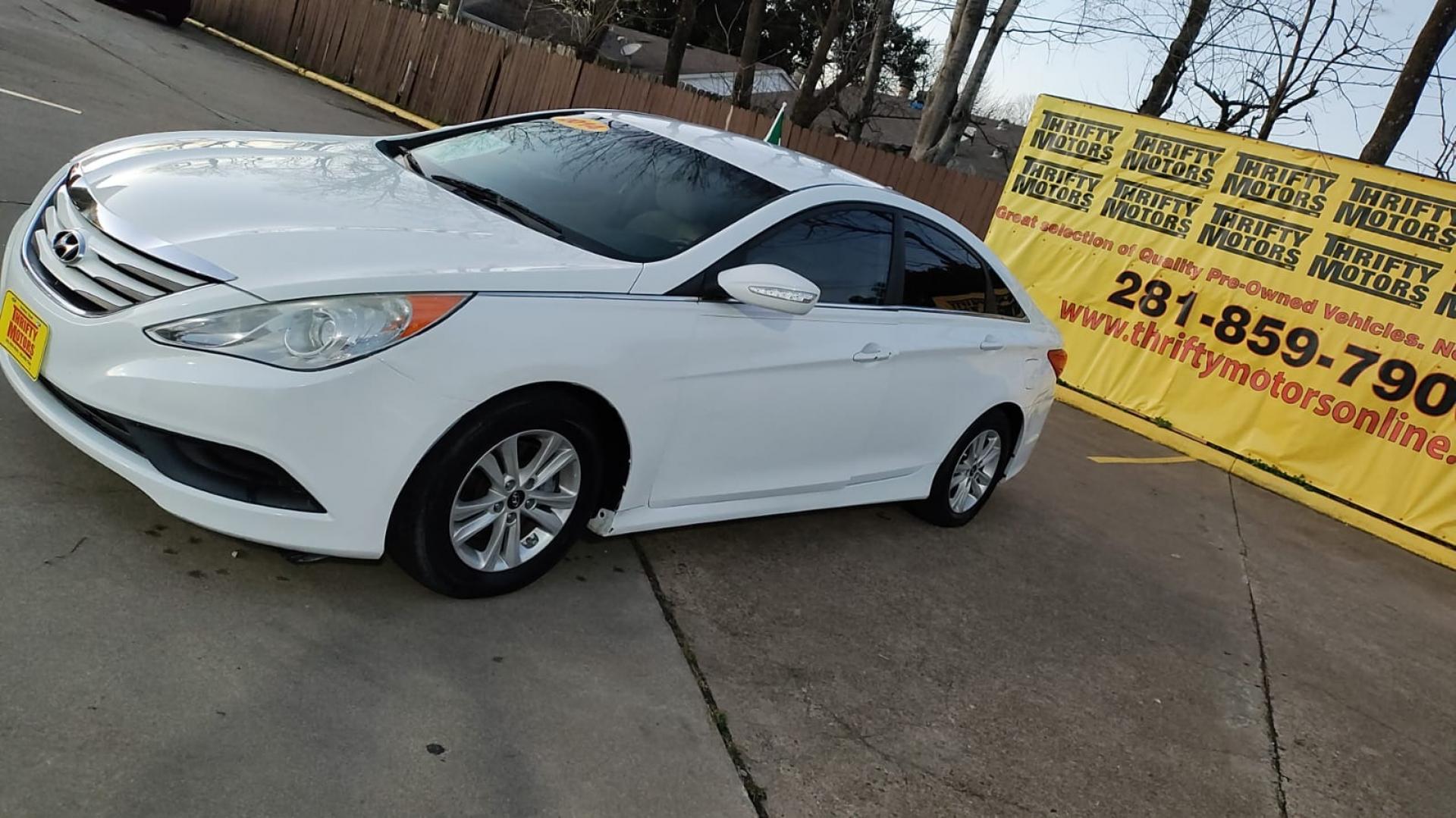 2014 Hyundai Sonata (5NPEB4AC4EH) , located at 16710 Clay Rd., Houston, TX, 77084, (281) 859-7900, 29.834864, -95.656166 - Photo#2